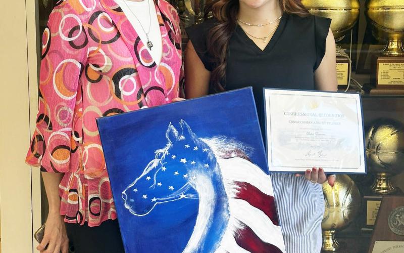 Carol Cunningham, with Congressman August Pfluger’s office, presented junior Sabri Zamora with a Congressional Recognition Certificate from Congressman Pfluger this week. The certificate was presented for being selected as a Regional Winner for the Congressman’s 2026 Congressional Art Competition, and her artwork will be displayed in Pfluger’s Llano office. Courtesy photo.
