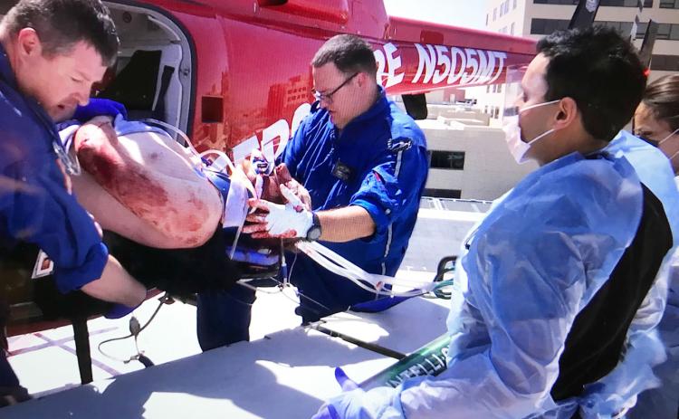 EMERGENCY MEDICAL CARE is the focus of Desert Doc, the new documen-tary filmed in part by Menard's own Steve Roberson. The photo above shows one of the real life emergency situations Steve filmed over 5 years at an Odessa hospital. Courtesy photo.
