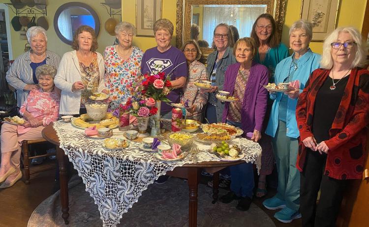 The Garden Club recently met at the home of Beverly Malcolm for a luncheon and craft project. The group created garden decor treasures out of old china pieces. Pictured left to right: Nancy Davis (seated), CeeCee Kelley, Betty Wilson, Betty Jackson, Mary Ann Medley, Beatrice Garza, Deb Brantley, JoAnn Royal, Beverly Malcolm, Linda Compton, Debbie Durst. Courtesy photo.
