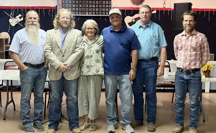 In last week’s edition we inadvertently misidentified Farm Bureau board member TYSON Roll in the photo above. Upon closer inpsection, 4th from left is actually Tyson and not Andrew Roll.