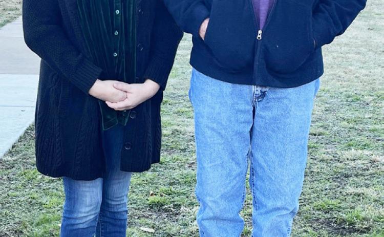 IN MEMORIAM of the late Roy McSherry, nephew Frankie McSherry, right, and his daughter/great nephew to Roy, The Honorable Judge Stacy Lawler (Menard County Justice of the Peace)were present for the unveiling of the plaque dedicating a portion of the courthouse lawn to their family member. The plaque reads: Roy Ellis McSherry Memorial Lawn Dedicated 12/11/2023. TMN photo.