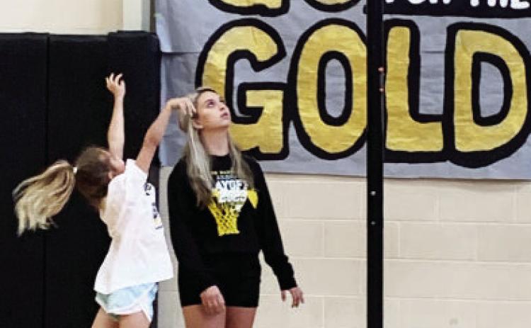 snagged this shot of a young basketball camper shooting under the watchful eye of MISD coach Kirsten Allen.  The camps, which started Monday, catered to boys and girls up to 8th grade, and concluded on Wednesday.