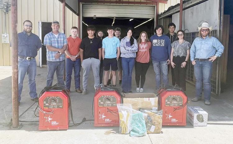 MHS Ag science/FFA department graciously accepted 3 new welders plus supplies, made possible by Menard County Farm Bureau. “I know the kids will be so excited to use them,” said Ag teacher Brittyn Walker. Farm Bureau representatives pictured above are, far left- Zach Nash and Tyson Roll; far right Cody Swindall.
