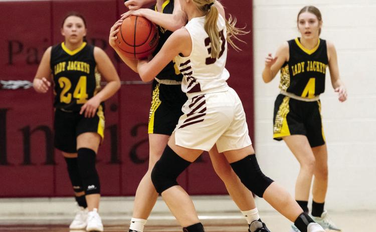 Freshman Lady Jacket Taytum Chambless works to avoid decapitation from a Paint Rock player in Menard’s 99-7 stomping of Paint Rock in a late district game. Perla Pecina and Kaitlyn Whitaker are in the background. Unfortunately for the Lady Js, they ended up on the losing side of their bidistrict matchup against Water Valley. Nora Davis, photo.