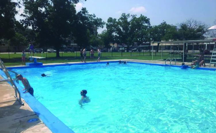 Kiddos staying cool in waters of the Menard Public Pool; at just $1 a visit, it’s an affordable way to beat the heat! Courtesy Photo.