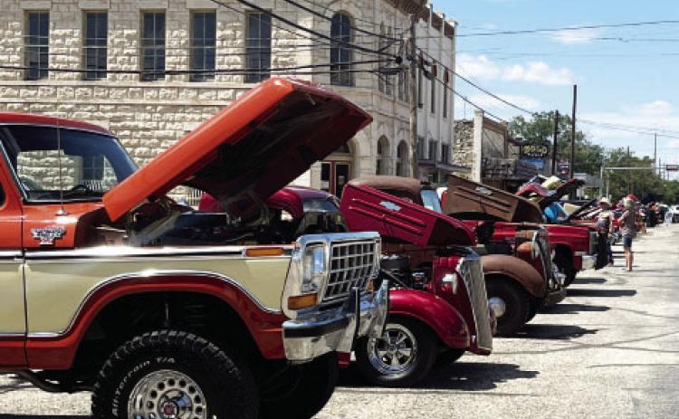 OF ALL TYPES were on display for the Sil-ver Spur's benefit car show on Saturday. Sixty-one vehicle entries pleased the crowds and raised $3k for Menard Youth Sports Association. TMN photo.