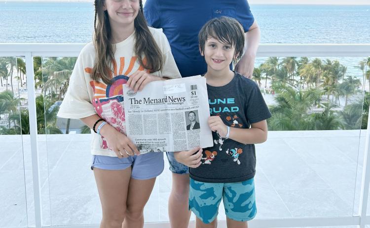 The Corbin family enjoyed the latest Menard News during their Cancun vacation last week. Claire, Cade, and George (pictured) and their parents Valera and Brandon were able to safely conclude their trip as scheduled, just missing Hurricane Beryl as she came roaring through the region.