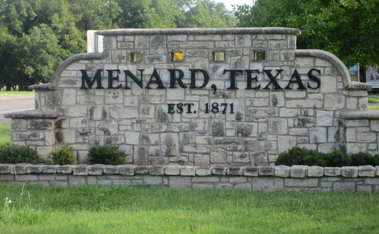 Rock sign reading Menard, Texas Est. 1871