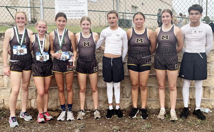 BELOW MHS cross country teams at Harper.