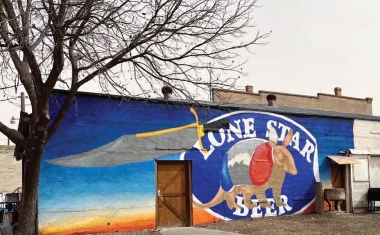 AND BOB WILLS MUSIC- Comes to mind when seeing the vibrant new mural painted on the west side of Johnson's Free State downtown. The building, located at 114 W. San Saba Avenue was formerly the Lone Star Beer distributorship. TMN photo