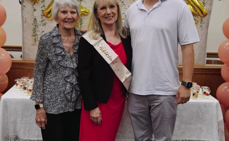 RETIREMENT PARTY FUN- Native Menardian Trish Nasworthy (center) poses with her mother Patsy Decker (l) and son Eric Saun at her retirement reception in Grand Prairie on May 31. Courtesy Photo.