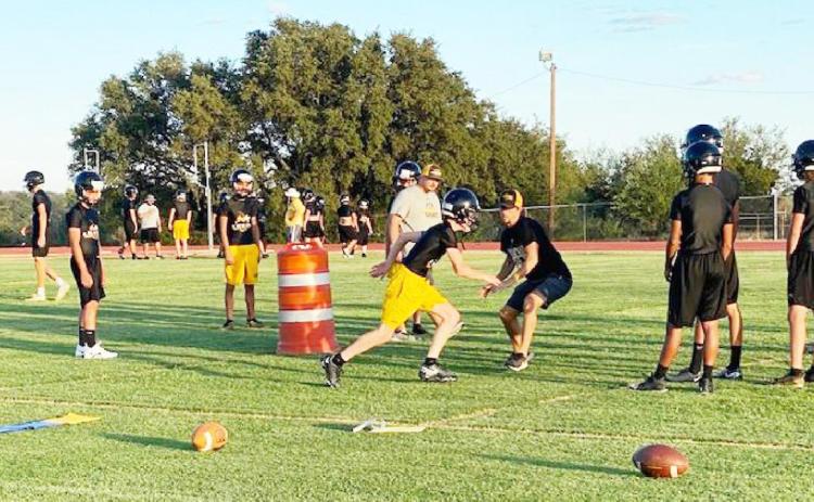 ABOVE- Yellowjackets and their coaches are putting in the work as official U.I.L. practices commence this week. Courtesy photo.