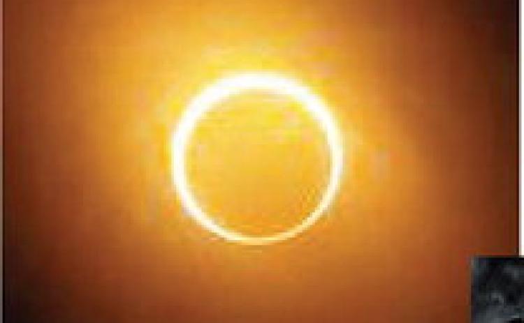 LEFT- Menard was smack dab in the of prime viewership for Saturday's annular eclipse. From the porch of Compton Warehouse, Conrad Owen took this photo which shows the moon almost exactly in front of the sun, just about to create the full ring of fire illusion. BELOW- The eclipse was thrilling, but an unexpected ground show captivated just as many. Crescent shadows were images caused by the projections of the sun while the moon was in its path.