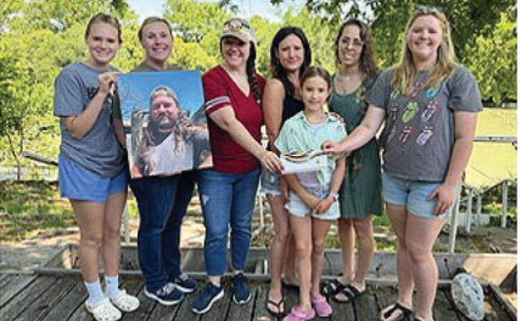 BEAUTIFICATION OF MENARD (BOM) board members received a $500 donation from the Houston Simmons Memorial Endowment Fund. Pictured (l to r) are the late Houston Simmon's niece Riley Abernathy, his three sisters Nikki Keegan, Katie Parker, Hannah Beall; niece Winnie Beall; BOM President Sarah Thigpen; BOM Secretary Jamie Hough. Read more about the organizations and donations on page 2. Courtesy Photo.