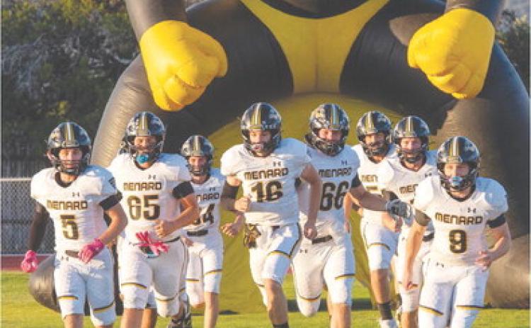 READY TO RUIN THE EAGLES' DAY are the varsity Menard Yellowjackets on the road in Leakey last week. Menard triple-swept Leakey, defeating their Junior High, JV, and varsity last Thursday afternoon. Pictured left to right- Kade Rayburn, Jadon Torres, Tucker Pullen, John Michael Eggleston, Brandon Spinks, Aidan Ramon, Wyatt Terrell, Hunter Whitaker. Nora Davis, photo.