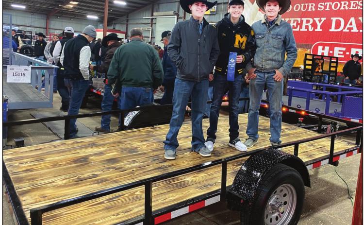 BLUE RIBBON BOYS-Menard High School Ag members (L to R) Sophomore Kade Rayburn, Junior Roy Brown, and Senior Houston Hayes earned a blue ribbon with their trailer build at the San Antonio Stock Show Ag Mechanics Show. Courtesy Photo.