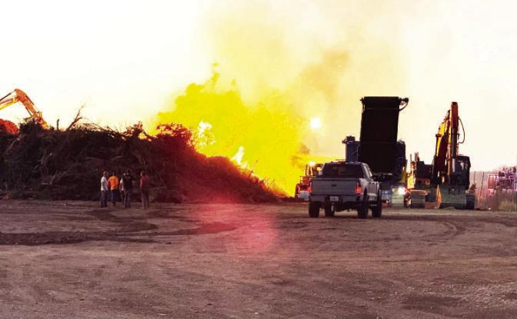 MENARD VFD, in conjunction with additional area agencies, responded to a fire in a flood debris removal brush pile near the airport west of town on Saturday evening. The blaze was fully contained and monitored over night. The fire's origin is under investigation; criminal activity is not suspected. Nora Davis, photo.