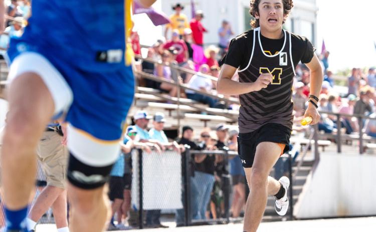 LEFT- Sophomore Marlee Salas races to catch the runner in front of him during the boys’ sixth place 4x400m relay finish at the area meet in Mertzon last week. Nora Davis, photo. See page 8 for more area track coverage.