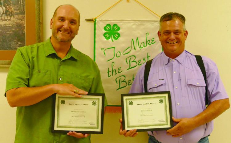 Menard County Judge Brandon Corbin (l) and Lewis “Cedarberry” Baker (r) accepted the Menard Co. 4-H Adult Leader Awards, chosen annually by the Youth Leadership Advisory Board to recognize adults who go above and beyond volunteering for 4-H. Courtesy Photo.