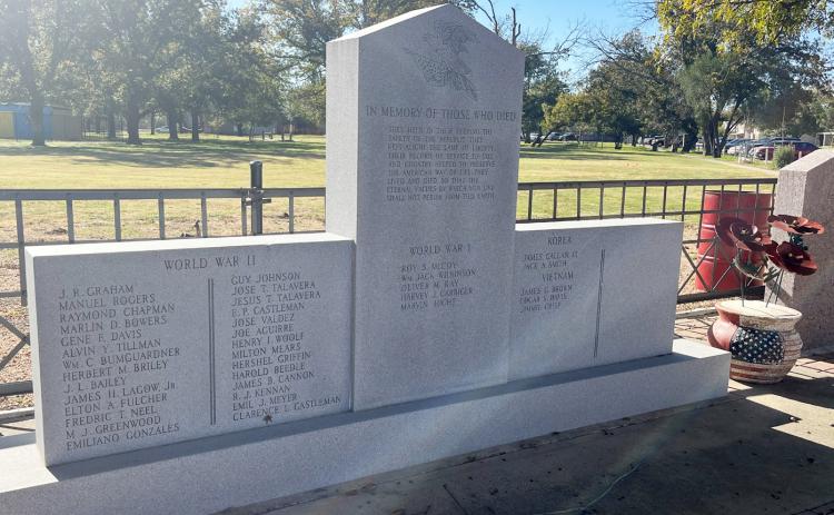 AMERICAN LEGION PARK is the site of the traditional PTO Veterans Day Parade and Auction. The park also houses a war monument dedicated to and recognizing Menard County war veterans from WWI, WW2, Korea, and Vietnam. There is also a memorial to Marine Corps General Oliver Prince Smith, who has been specifically commended for his brave actions during both WWII and Korea. Smith, born in Menard in 1893, retired as a 4-Star General. He passed in 1977. TMN photo.