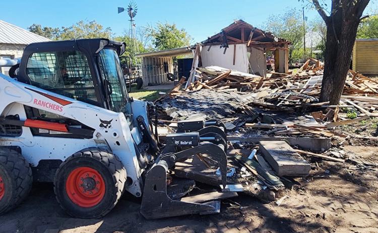 DEMOLITION of an abandoned structure on Bevans St. was recently completed by city crews. With the landfill pit reopened and an anonymous donation to purchase a skidsteer, the city hopes to tackle additional unsafe buildings in the future. Courtesy photo.
