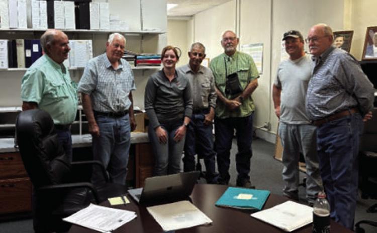 WORKING TOGETHER, MCSWD and Menard County Farm Bureau partnered up to send Jacey Sealy to Monterey, California to Range Camp II. MCSWDC Directors pictured are (l to r): Jerry Kidd, Billy Kniffen, Range Camp II attendee Jacey Sealy, Benny Fred Kothmann, Gary Treadwell, Menard County Farm Bureau Board member Tyson Roll, and J.W, Jennings. Courtesy Photo.