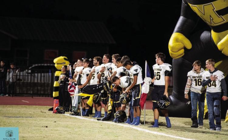 The last national anthem of the season looked a little unorthodox, ‘Jackets scrambled to get together, yet was as inspirational as ever.
