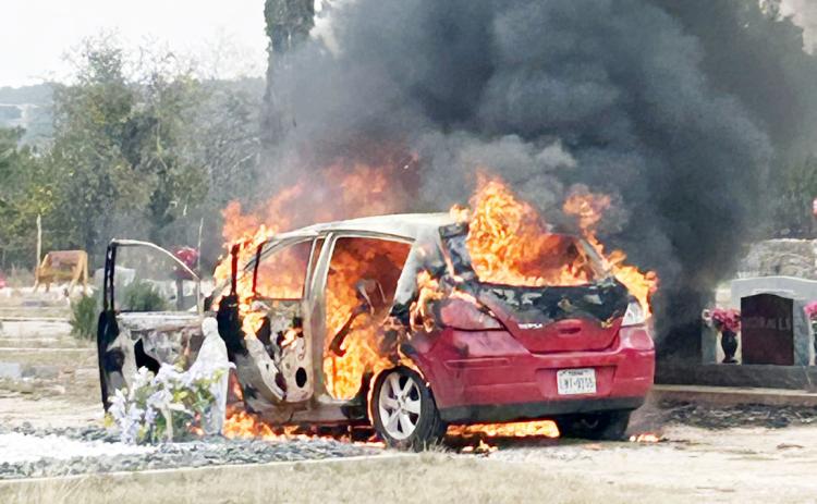 BELOW-Menard Volunteer Fire Department responded to a vehicle fire early Tuesday afternoon. The occupants were passing through Menard when the fire broke out. The driver immediately pulled over and dialed 911. MVFD responded promptly and was able to successfully extinguish the fire. The car was a loss but there were no injuries. Photo by MCSO.