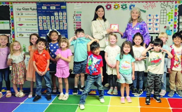 TRTA presents books to Menard Pre-K students
