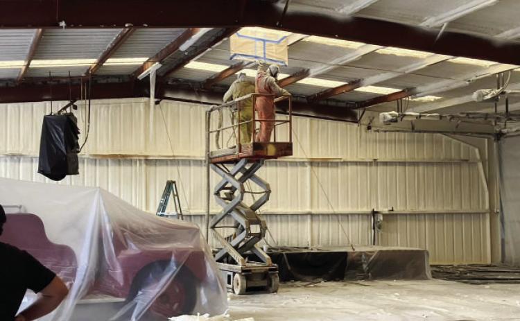 NO MO' SNOW- The old, falling (snowing) fiber insulation at MVFD station has been replaced with efficient and clean spray foam insulation. The VFD will hold their annual BBQ fundraiser this Saturday, and invites the community to see the much-needed upgrades their donations have funded. Courtesy photo.