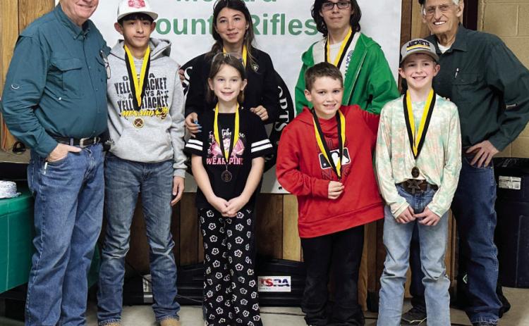 BELOW- Menard 4-H Rifles Coach Terrell Kelley, Mason Mireles, Kylie Smith, Mia Estrada, Abraham Hill, Jackson Thigpen, Gus Wright, Coach David Hand. Courtesy photo.