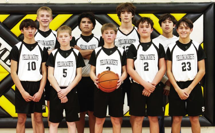TRAILBLAZING ONWARD- The grade 7 and 8 Junior Jackets completed an undefeated district basketball season last week. Pictured front row, left to right: Julius Zamora, Kade Bannowsky, Mack Davis, Sam Mayfield, Maddox Saiz. Back row: Benjamin Burch, Dario Gonzales, Wesley Compton, Marlee Salas. Nora Davis, photo.