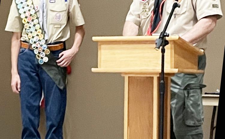 Nicholas Royal, grandson of Bill and Jo Ann Royal of Menard, recently accepted his Eagle Scout pin and sash from a Scout leader. A junior at Lake Travis High School, Nicholas has followed in his grandfather Royal’s footsteps, who is also an Eagle Scout. Courtesy photo.