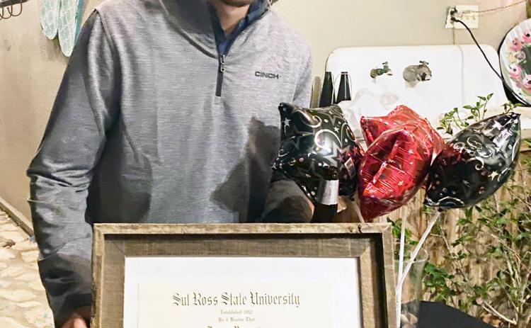 MENARD NATIVE Logan Rogers proudly displays his hardearned bachelor of Applied Science degree from Sul Ross State, completed in December. Courtesy photo.