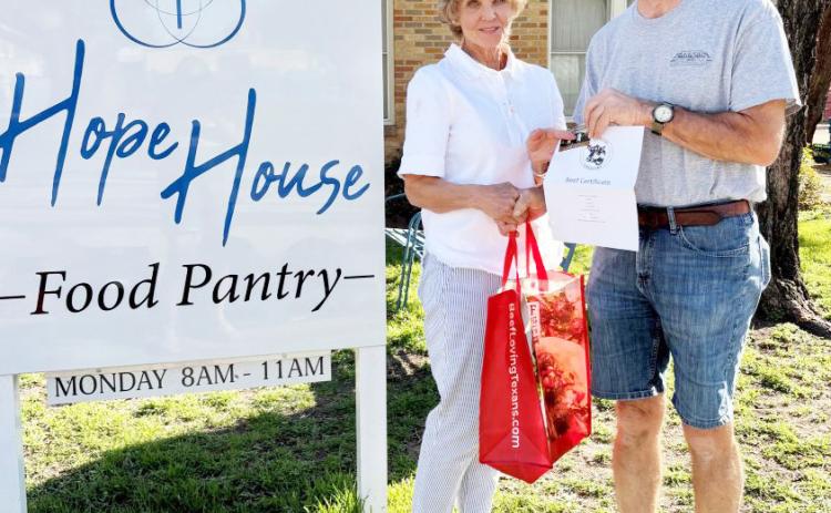 HCCW donates beef vouchers to Hope House
