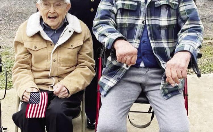RET/SFC Anastacio (Butch) Aguilar, pictured back, lead Saturday’s Veterans day Parade parade in a military jeep. He was accompanied by Mr. William Potter, left, who is Menard’s oldest living veteran at (nearing)102 years old. Potter served in WWII. Pictured right is veteran Mr. Carl Kothmann. Courtesy photo.