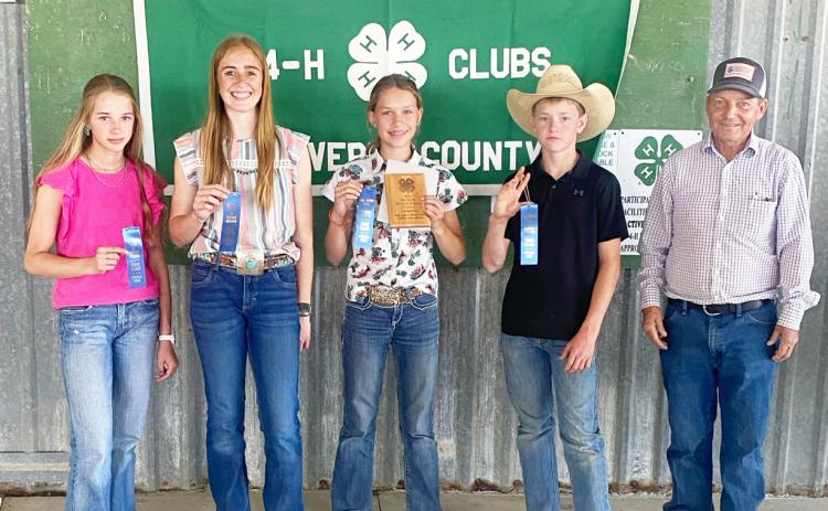 A skeleton crew of wool and mohair judgers who were not playing baseball or softball on Saturday, still got it done at the contest in Del Rio. Pictured left to right: Taytum Chambless, Mackenzie Wright, Channing Chambless, Kade Bannowsky, Bill Zuberbueler with Val Verde Wool &amp; Mohair. Courtesy photo.