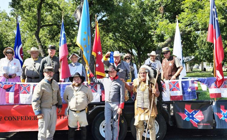 LEFT- The local Sons of Confederate Veterans chapter (SCV) recently won first place in the ‘Out of Town’ division in the Kimble County Chamber of Commerce’s rodeo weekend parade in Junction. The SVC participates in community activities including Menard’s annual Veterans Day Parade in November. They also routinely recognize veterans across all wars and military branches.