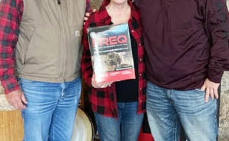 IT'S A FAMILY AFFAIR at Burnham Brothers. Below, FREQ inventor Gary Roberson, left, with wife Deb and son Steve are happy to announce their revolutionary ultrasonic game call is now in house and available for purchase. Courtesy photo.