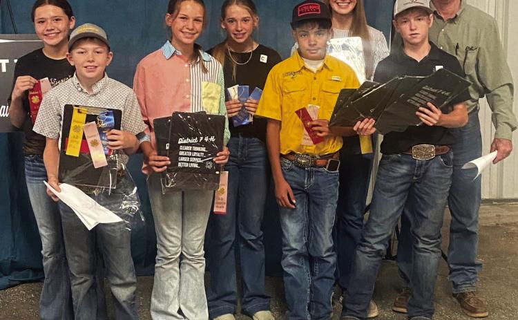 Menard Wool and Mohair Judging team members who competed in the District 7 Wool and Mohair Judging contest are, l to r: Kate Baker, O’Dan Wright, Channing Chambless, Taytum Chambless, Ian Brown, Makenzie Wright, Kade Bannowsky, Coach Jason Bannowsky. Courtesy photo.