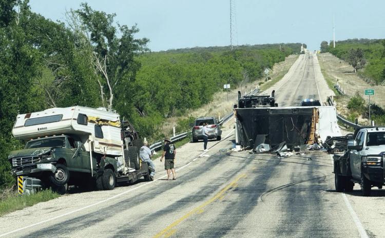 Various debris was strewn across SH 29 Sunday afternoon, after a travel trailer being towed by an SUV started swerving, then toppled. Photo courtesy MCSO.