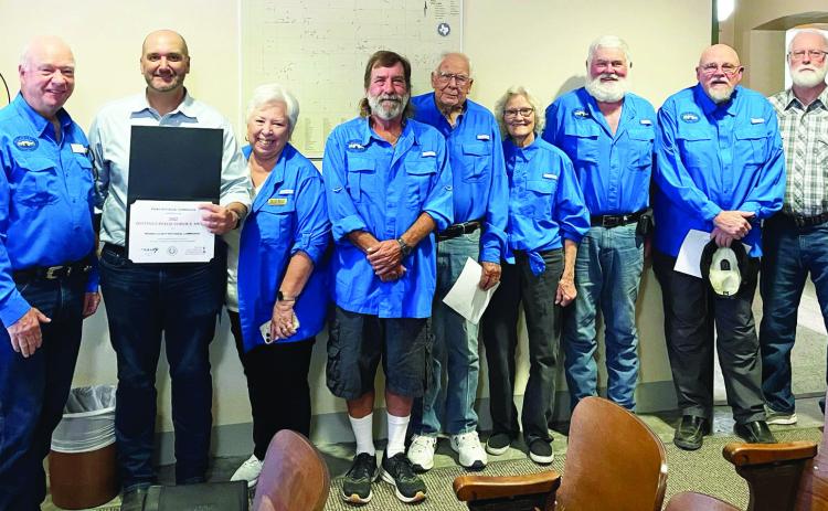 EIGHT IS GREAT- in regard to Menard's Historical Commission service awards. Pictured above, left to right: MCHC Chair Terry Kelley; Judge Brandon Corbin; Cee Cee Kelley; Carl Laning; John Kniffen; Katherine Kniffen; Barry Kniffen; Bob Brown; Stan Roberts. TMN photo.