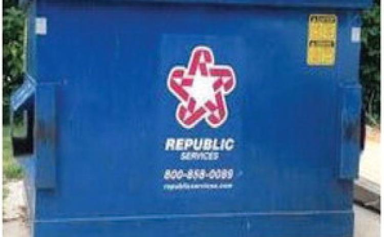 Republic Services dumpsters, like the one pictured, are now subject to fines if lids are not fully closed at trash pickup. This stipulation has been in the City’s contract and is recently enforceable with the company’s addition of GPS cameras on the trucks.