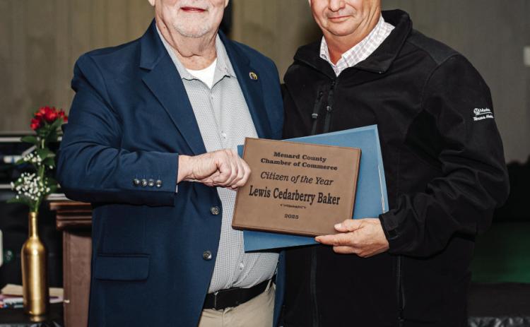 MODEL CITIZEN- He may not be a model, but he is a very generous and hard working citizen of Menard. Lewis 'Cedarberry' Baker, right, accepts his 2025 Citizen of the Year Award from Chamber of Commerce director Dean Mayhew, left. R. Guerrero, photo.