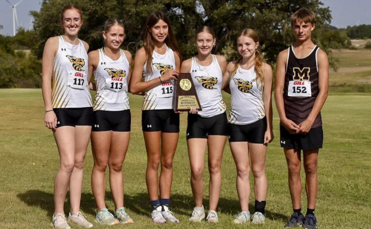 DISTRICT RUNNERS UP- The Lady Jackets were just 4 points from the district cross country title this week. Pictured left to right: Makenzie Wright, Taytum Chambless, Danni Ruiz, Kaitlyn Whitaker, Isabelle Devine, and lone Jacket, Jaegar Leonard. Nora Davis, photo.