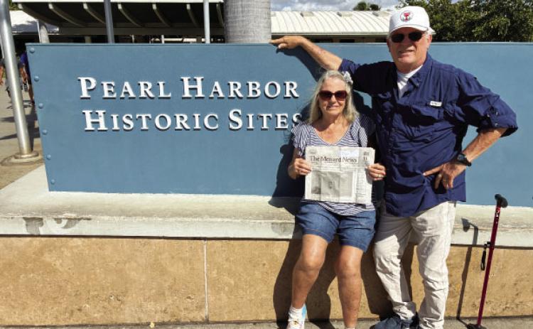 ALOHA- Buffy and David Powell recently traveled to Hawaii and were thoughtful enough to take The Menard News along, as shown here at their visit to the Pearl Harbor Historic sites. Looks like a great trip, thanks for thinking of us, Powells! Courtesy photo.