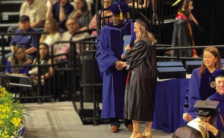 Menard’s Kyra Ramon, shown above receiving her college diploma, graduated from Angelo State University on Saturday, May 11 with an English degree including Secondary Education Certification. Ramon completed her student teaching at Mason ISD and plans to teach English in the area in the fall. Courtesy Photo.