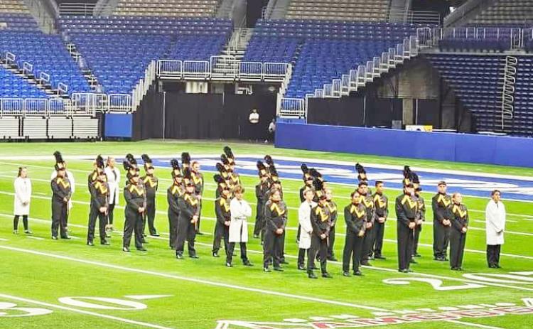 Menard’s band positioned on the field at the Alamodome, awaiting the results announcement.
