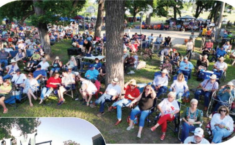 RIGHT- This aerial shot, taken prior to Asleep at the Wheel taking the brand new Max Hooten stage, captures hundreds of attendees enjoying the fair weather and friendly crowds under the ancient pecan trees on the San Saba River. Menard County Chamber of Commerce's River Rat Music Fest was held Saturday evening. Photo courtesy Rafter N Photography.