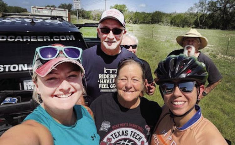 RIDING FOR A CAUSE-Local 15 year cancer survivor, Molly Jack Moser Waldrop, flanked by, Capt. Jennifer Kennedy and Sgt. Christian Laflour with Sgt. Ronnie Mascheck, Lt. Wayne Kennedy (hiding), and Richard Hernandez in the background. Sgt. Kennedy has carried tags in honor of Molly for many years. Courtesy Photo.